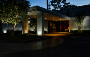 A home in Houston, TX, with residential landscape lighting